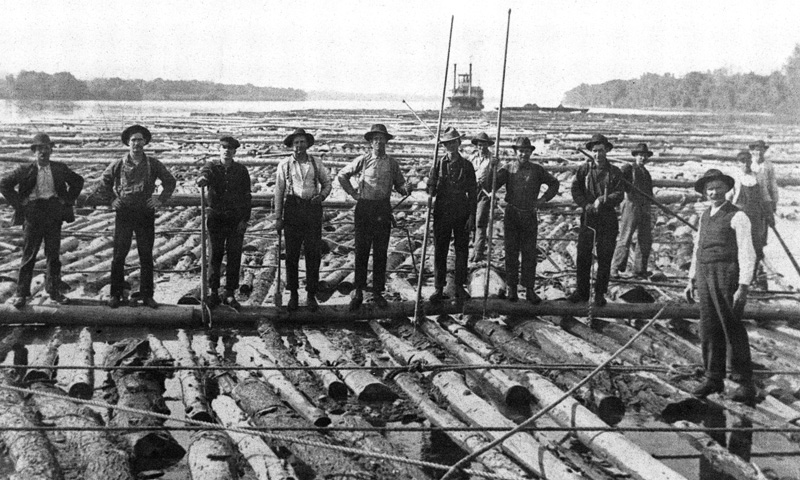 Rafts of logs, like this one photographed in the 1890s, were targets of river pilots.Photo courtesy of La Crosse Public Library Archives