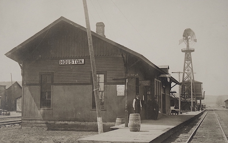 Around 1900, the train depot in Houston sat near a wooden water tower and windmill. Photo courtesy of the Houston County Historical Society