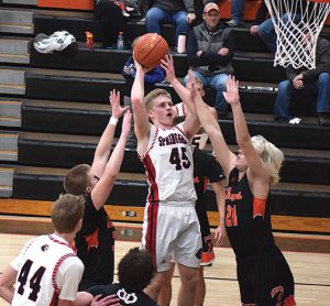 Solum shoots over Burros player 