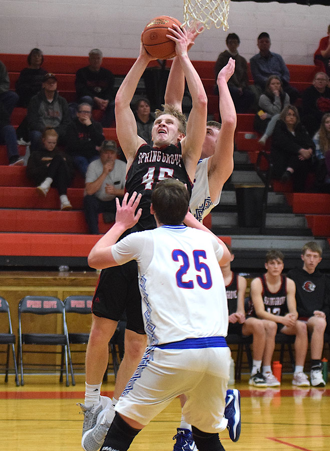 Solum’s 26 helps short-handed Spring Grove boys avert upset in overtime