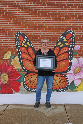 Suzanne Gardner with butterfly wings