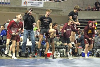 Chatfield's bench celebrates their win.