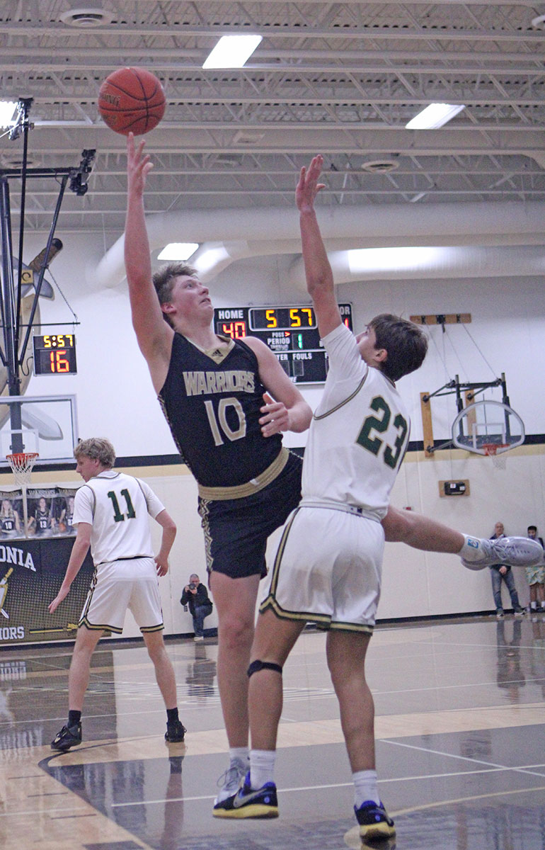 Garrett Konz Shoots over R-P's Creighton Hoiness