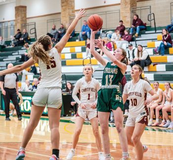 Magin shooting over Knutson Girls Basketball