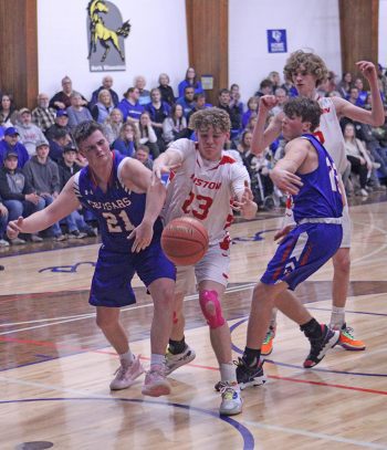Hayden Erickson and Darian Hershberger vs Alex Wedl in Boys Basketball.