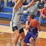 Kingsland's Jayden Brink guards M-C's Riley Snell