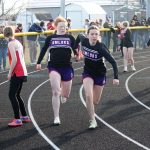 Gracie Foster Hands off to Breely Galle in the 4x200