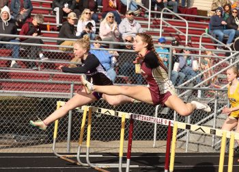 Emma Lewison gets through hurdle ahead of Rebecca Copeman