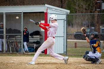 Houston’s Tristan Stinson connects with the ball