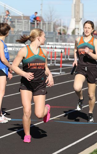 Sahara Morken waits for the baton
