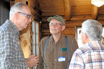 Al Batt, left, took time to visit with people following the Lunch and Learn event. Photo by Barb Jeffers