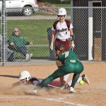 Britin Ruskell slides into home base