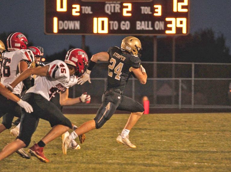 Caledonia's Ben Stemper bursts free for touchdown