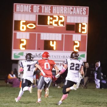 Houston’s Axel Vix bolts towards the end zone as Kingsland defenders Michael Johnson (#7) and Sam Howard (#22) trail. Vix had a pair of receiving TDs, but the Knights rode Zach Reiland’s big game to a 38-28 win in a contest that went back-and-forth. Photo by Christine Vreeman