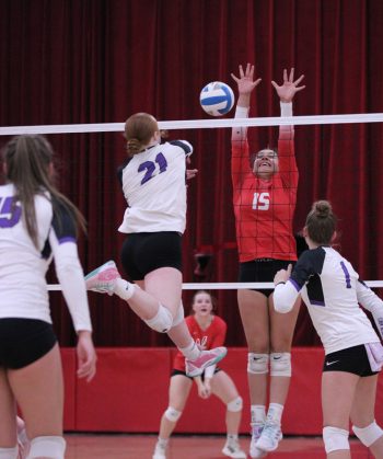 Grand Meadow's Gracie Foster slams the ball