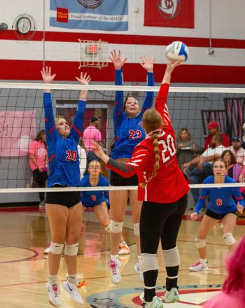 Mabel Canton's Kinley Soiney and Hope Erickson block at the net