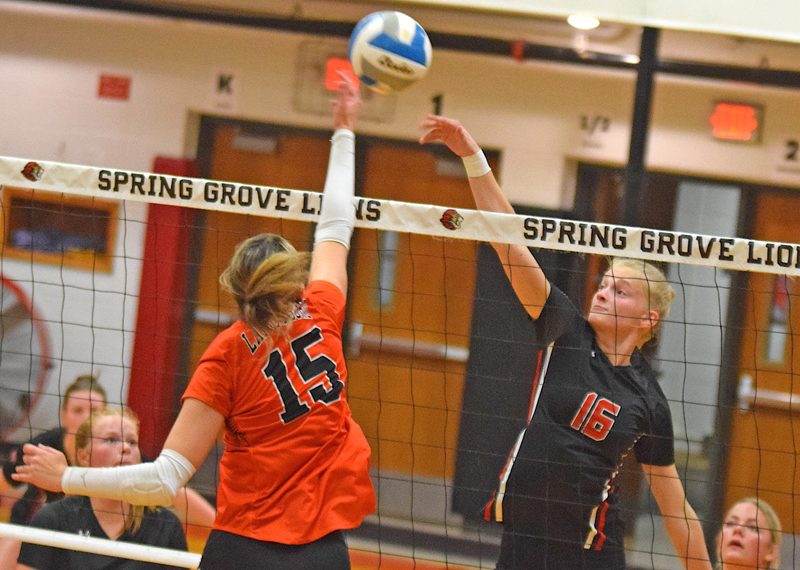 Spring Grove's Joelle Halverson and Lanesboro's Taylor Hanson vie for the ball