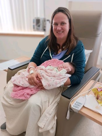 Baby Claire is able to join her mother at her chemo appointment. Photo by Ruth DeJarlais