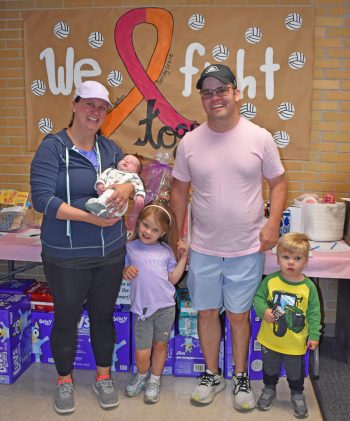 Kirsten, Claire, Kendall, Paul, and Gable Snell of rural Burr Oak, Iowa. A silent auction and a diaper drive was held during a recent Mabel-Canton and Spring Grove volleyball game. Both schools were raising money for a local community member diagnosed with cancer. This year the recipient was Kirsten DeJarlais Snell. Photo by Heather Kleiboer