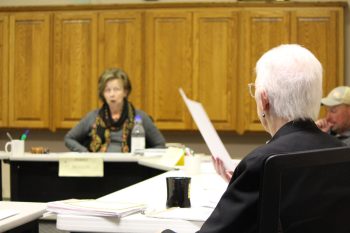 Rushford City Clerk Kathy Zacher discusses matters at the October 15 meeting. Looking on are Mayor Terri Benson, left, and Councilor Andrew Linder, right. Photo by Kirsten Zoellner