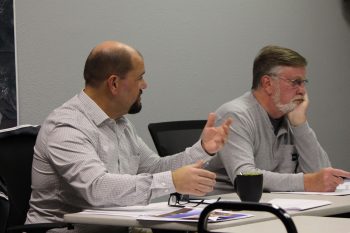 Rushford City Administrator Tony Chladek, left, discusses recent survey results at the October 15 council meeting. Pictured at right is Councilor Jim O’Donnell. Photo by Kirsten Zoellner