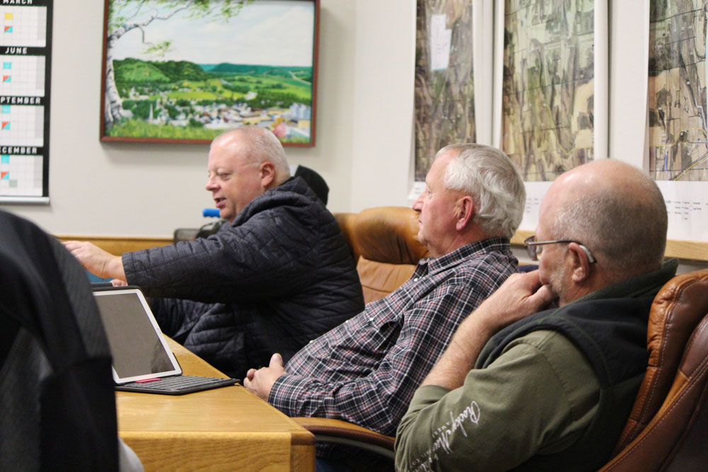 Rushford Village Mayor Dennis Overland, left, moves the October 15 meeting along. Pictured at right are Councilors Rick Ruberg and Mike Ebner. Photo by Kirsten Zoellner