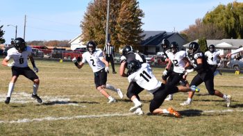 Fillmore Central’s Cody Serfling makes the tackle on Blooming Prairie’s Cole Wangen in the teams’ nail-biter Section 1A semifinal. FC led 39-20 in the fourth, BP tied it at 39, only for Bridon Bahl to hit Josh Haugerud for a 55-yard TD pass, and then the Falcon defense hold, in a 46-39 win. Photo by Deb Finseth