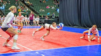 Chatfield’s Cora Bicknese dives to save a ball versus Hawley in a state semifinal match as teammates Jaelyn LaPlante (right) and Trindy Barkeim (left) look on. The Gophers led 2-1 but fell 3-2 in a hard-fought contest. Photo by Leif Erickson