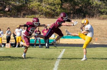 Chatfield’s Ethan Cole is going to get a piece of this punt by Dover-Eyota’s Talen Rabe in the teams’ 1AA semifinal. Ayden Miner is on his heels. The Gophers easily handled the Eagles 53-14 to move on to the 1AA championship game. Photo by Leif Erickson