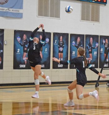 Fillmore Central’s Kyla Hellickson retreats and keeps the ball alive as teammate Ella Dahly is also pictured. The sixth-seeded Falcons swept Wabasha-Kellogg in a 1A Round of 16 game to move on in the playoffs. Photo by Deb Finseth