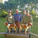 From right to left: Wyatt Pudenz, Rick Smith, Christian Jacobsen and James Jacobsen with two Brittany Spaniels. Photo submitted