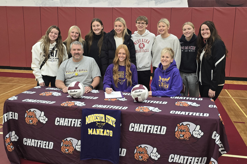 Chatfield’s Jaelyn LaPlante has signed a letter of intent to play volleyball at MSU-Mankato. The 1,000-plus kill senior is flanked by her parents Greg and Dayna and surrounded by teammates and her Coach Kristi Rindels. Photo submitted