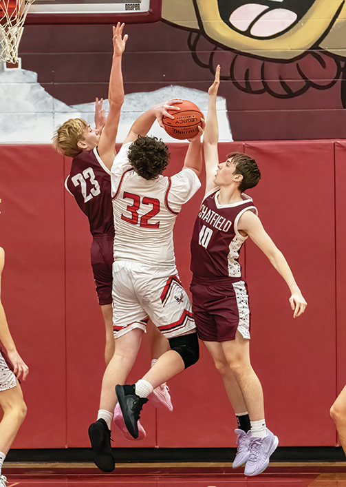 Chatfield’s Keyan Danninger (#23) and Ryan Rindels (#10) defend against Wabasha-Kellogg’s Bryar Ender in the team’s TRC affair. A win over the Falcons was one of three on the week for the Gophers, which matched last year’s win total (three) in the span of five days.