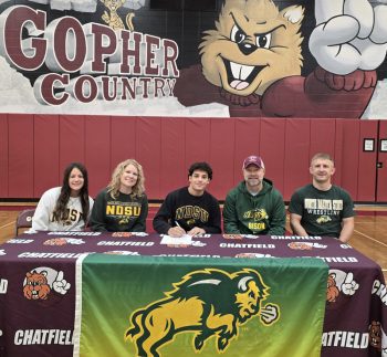 Chatfield’s Javier Berg recently signed a letter of intent to wrestle collegiately at North Dakota State. Berg is flanked by his sister Chloe, mom Elizabeth Fugelstad, step-dad Derek Fugelstad, and Chatfield head wrestling coach Matt Mauseth. Berg has been a state champion (106) and state runner-up (114) the past two years.” Photo submitted