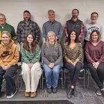 At the last meeting for Daniel Small as a school board member, back row, left to right: Spencer Yohe, Derek Adamson, Tim Gunn, Mike Peterson, and Small. Front row: Student School Board representatives Addie Fruechte and Samantha Peters, Melissa Marschall, Julie Augedahl (new board member), and Leigh King.