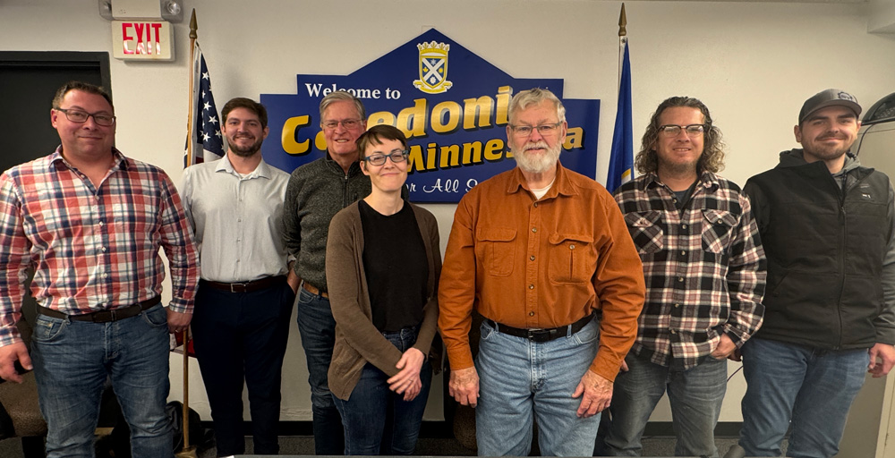 After 12 years serving the residents of Caledonia as their mayor, DeWayne (Tank) Schroeder bids farewell, and thanks his colleagues for their support. Pictured from left to right: Public Works/Zoning Director Casey Klug, City Clerk/Administrator Jake Dickson, Councilors Bob Klug and Amanda Ninneman, Mayor Schroeder, and Councilors David Fitzpatrick and Ryan Stenzel.