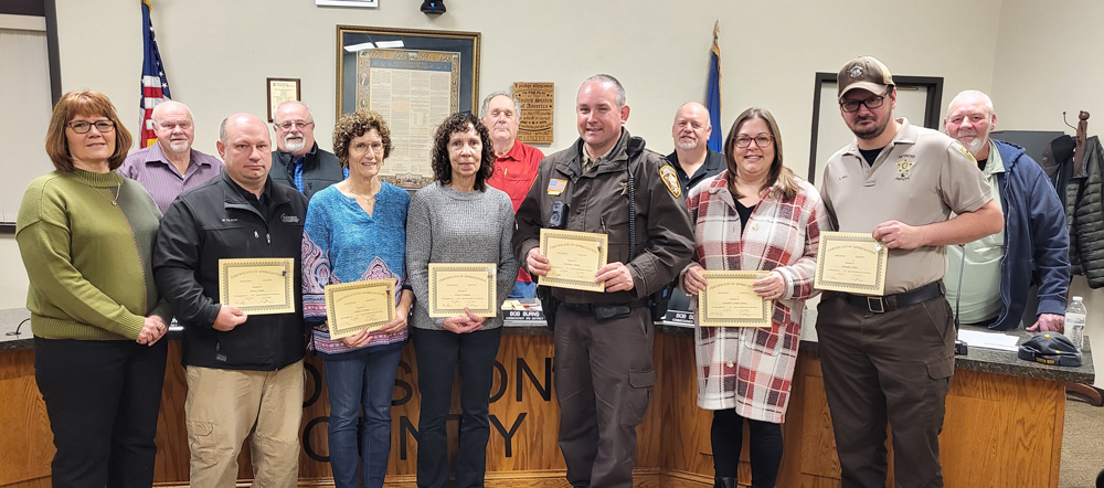 The Houston County Board of Commissioners recognized and thanked 13 employees for their service to the county. Back Row, L to R: Board of Commissioners – Dewey Severson, Eric Johnson, Bob Burns, Bob Schuldt and Greg Myhre. Front Row, L to R: Carrie O’Heron, 45 years; Mark Olson, 25 years; Tammy Mauss, 35 years; Carol Lapham, 40 years; Jon Kulas, 20 years; Jennifer Daley-Oakes, 10 years; A.J. Bird, 10 years. Not pictured: Cindy Augedahl, 45 years; Liza Jandt, 35 years; Tom Peter, 35 years; Lori Feldmeier, 20 years; Melissa Jordan, 10 years; Jordan Goeden, 10 years.