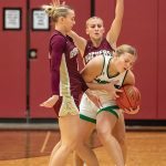 Chatfield’s Grace Schroeder (left) and Brittin Ruskell (right) trap La Crescent/Hokah’s Charlee Gile in the teams’ TRC affair. Schroeder scored a game-best 23 points in a 55-37 Gopher win. Photo by Leif Erickson