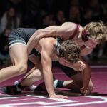 Chatfield’s Layne Root controls LARP’s Michael Alexander from top position in the teams’ key TRC dual. But #1 in Class A Chatfield (8-2) was way too much for the unranked but good Screamin’ Eagles (12-2), as they notched a 58-9 win. Photo Leif Erickson