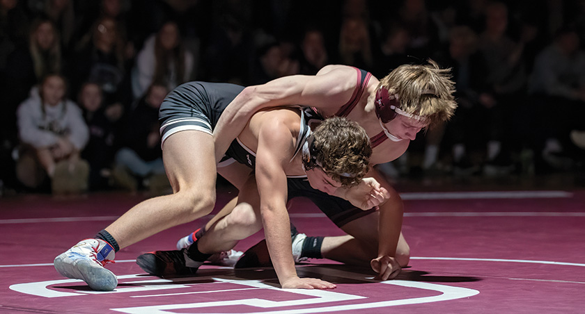 Chatfield’s Layne Root controls LARP’s Michael Alexander from top position in the teams’ key TRC dual. But #1 in Class A Chatfield (8-2) was way too much for the unranked but good Screamin’ Eagles (12-2), as they notched a 58-9 win. Photo Leif Erickson