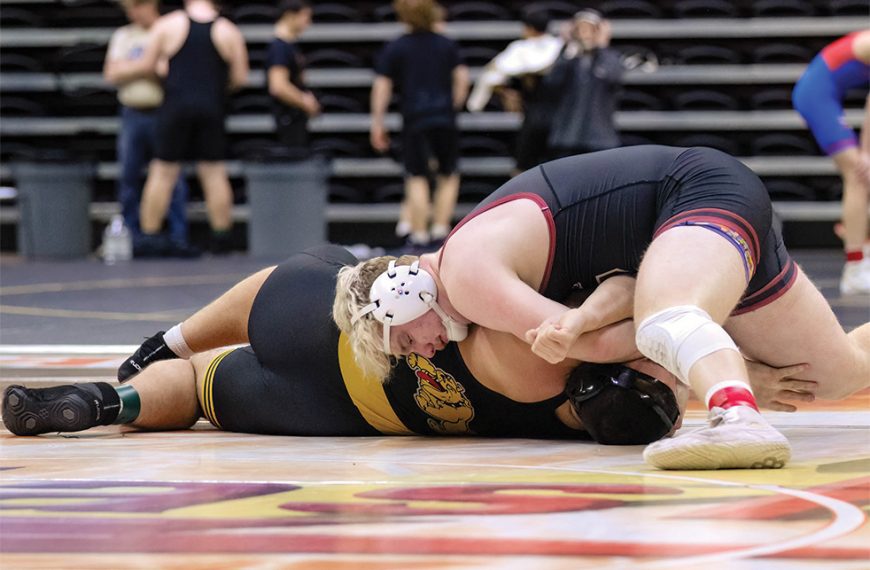 Chatfield’s Cole Ramaker works for a pin (he would get) in the Gopher’s dual with Bettendorf Iowa at “The Clash.” Chatfield lost the Friday placement first place match to Bettendorf, but they took a still strong sixth overall at the set of duals held in La Crosse. Photo by Sarah Sexton