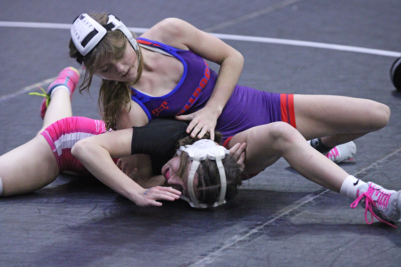 GMLOS’ Paisley Schlee has her consolation bracket opponent in a pickle at the Bi-State tourney. At 107-pounds, Schlee (eighth of 31) was one of five Bulldog gals to place at the large-scale event. Photo by Paul Trende