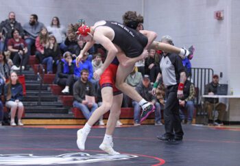 GMLOS’ Cael Smith takes LARP’s Carter Bronk for a ride in the 139-pound bout at the Screamin’ Eagles’ triangular. Smith posted a 10-0 major decision win. It was one of just four wins for the Bulldogs in a 53-22 LARP win. Photo by Paul Trende