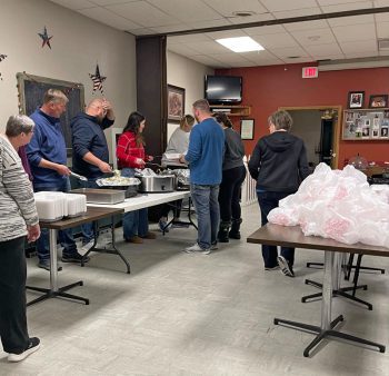 The Walsh family preparing the meals for their last Christmas Day dinner project. Photo submitted