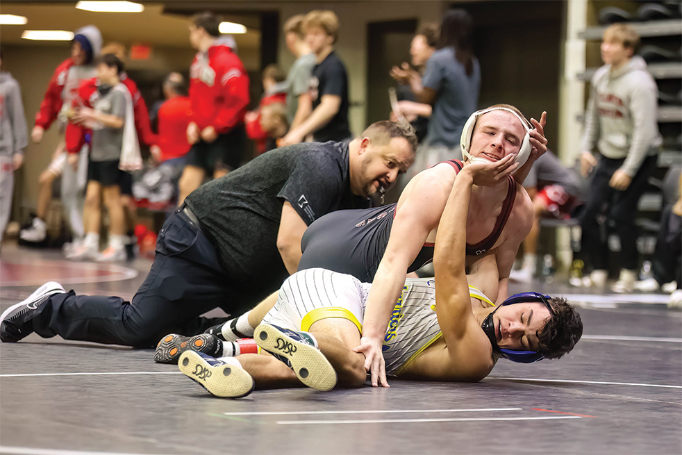 Kansas City Pius X’s Dillan Chisam tries to ward off Chatfield’s Hunter Polikowsky in a dual at “The Clash.” Polikowsky notched a late third period pin in the match, and the Gophers beat the defending Missouri state champs, part of their sixth place (of 32) finish at the marquee event. Photo by Sarah Sexton