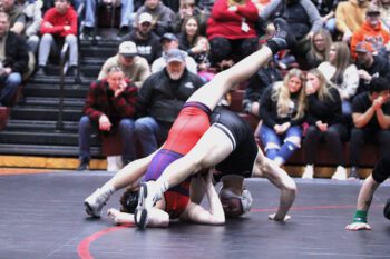 LARP’s Carter Cady gets back points a rare way on GMLOS’ Calum Sween at the Screamin’ Eagles triangular. Cady eventually got the pin, as LARP beat GMLOS 53-22 and W-K 64-12. Photo by Paul Trende