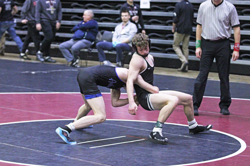 LARP’s Owen Lange tries to escape versus Auburndale’s Zade Grassel in a consolation match at the Bi-State tourney. Lange was one of two Screamin’ Eagles to place, taking 10th (of 56) at 126-pounds. Teammate Zach Plank took eighth (of 51) at 190-pounds. Photo by Paul Trende