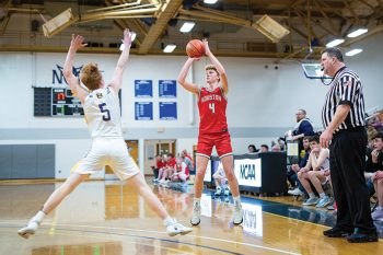 Houstons’ Morgan Rohweder rises up for a three over an MFL-Mar Mac defender in the teams’ Border Battle contest in Decorah. The ‘Canes prevailed 60-52 to improve to 5-2 on the year. Photo by Emma Geiwitz