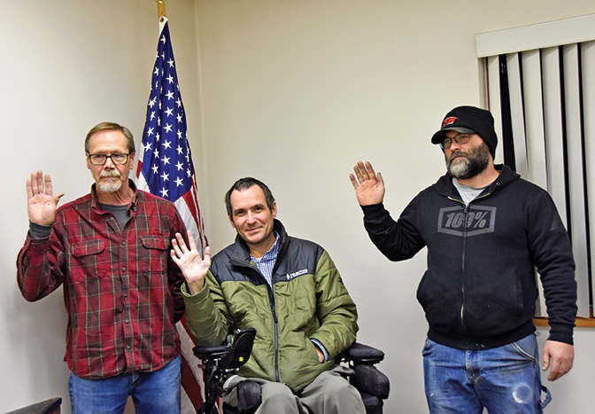 At the January 14 Eitzen City Council meeting, Mayor Jeff Adamson and councilmembers Mitch Luttchens and Mitch Lange took the oath of office. Photo by Charlene Corson Selbee