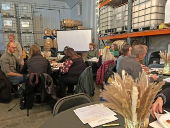 Chamber members socialized at Harmony Spirits before the business meeting Photo by Wanda Hanson